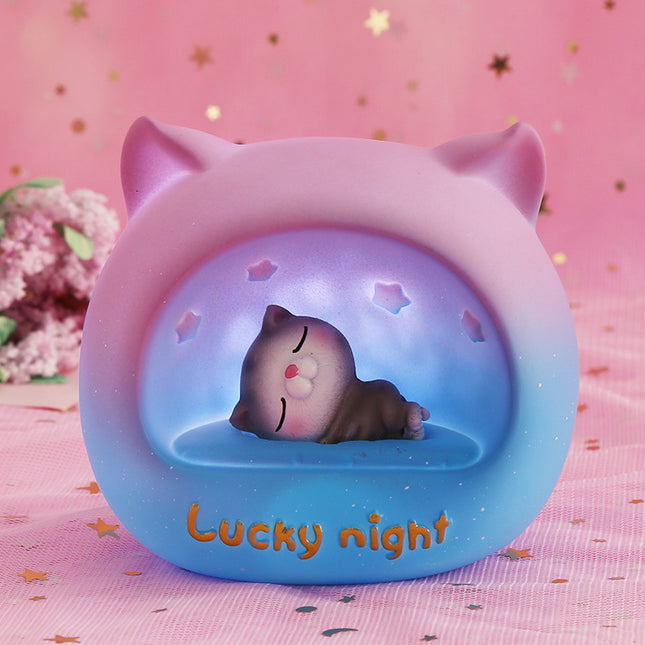 Rundes LED Nachtlicht mit schlafender Katze