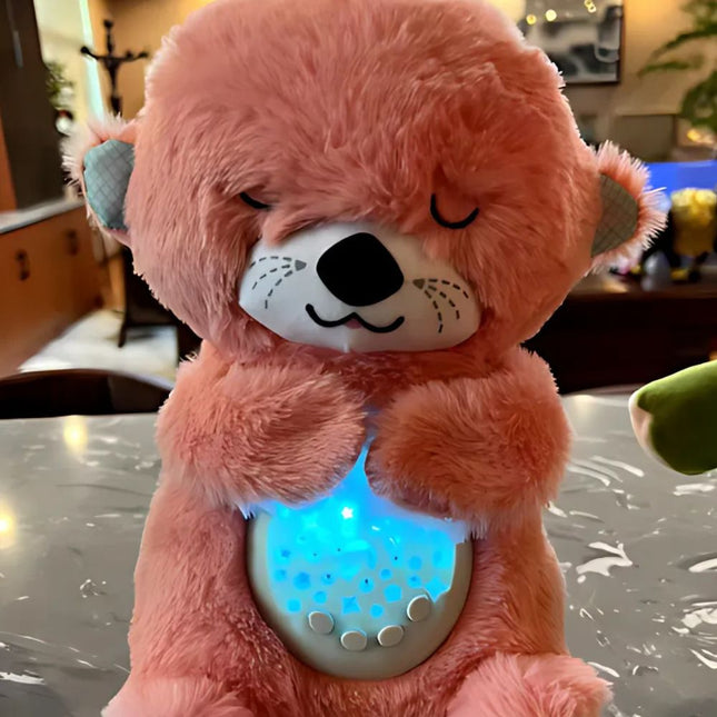 Schlafender Otter Plüschtier mit Sternenprojektor