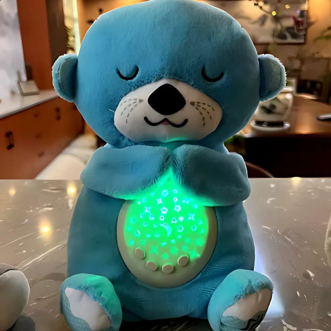 Schlafender Otter Plüschtier mit Sternenprojektor