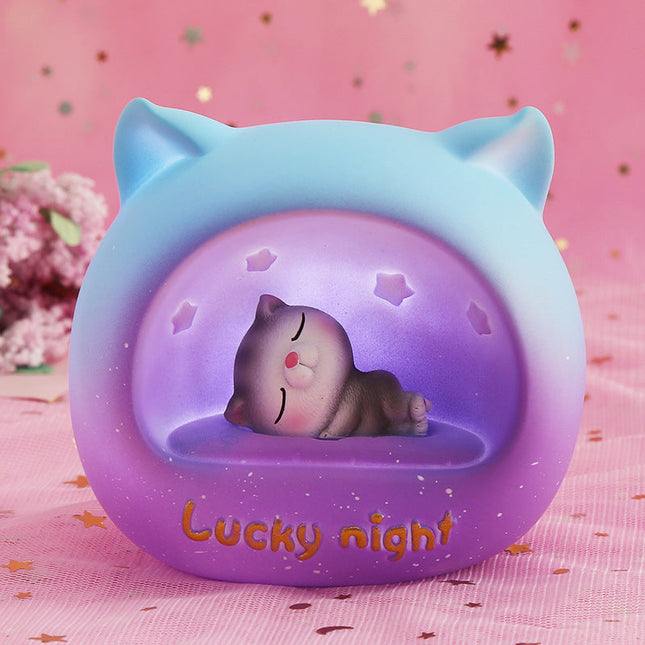 Rundes LED Nachtlicht mit schlafender Katze