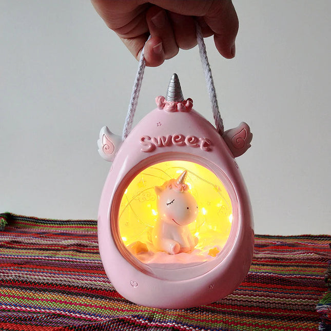 Pastellfarbenes Einhorn Nachtlicht zum Tragen